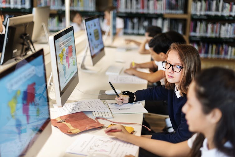 Don't worry, a school library with fewer books and more technology is good for today's students