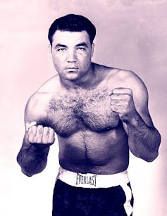 In his youth, Clyde Oxendine was a boxer and the bouncer at The Volcano, a bar frequented by Lumbee Indians.Photo by C. Cullison, The News American, September 30, 1963. Baltimore News American Photo Archive, Special Collections and University Archives, University of Maryland College Park. Permission granted by the Hearst Corporation, Author provided