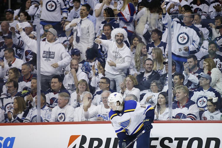 Winnipeg is one of many NHL cities where fans uniformly dress in their team colours during the playoffs.