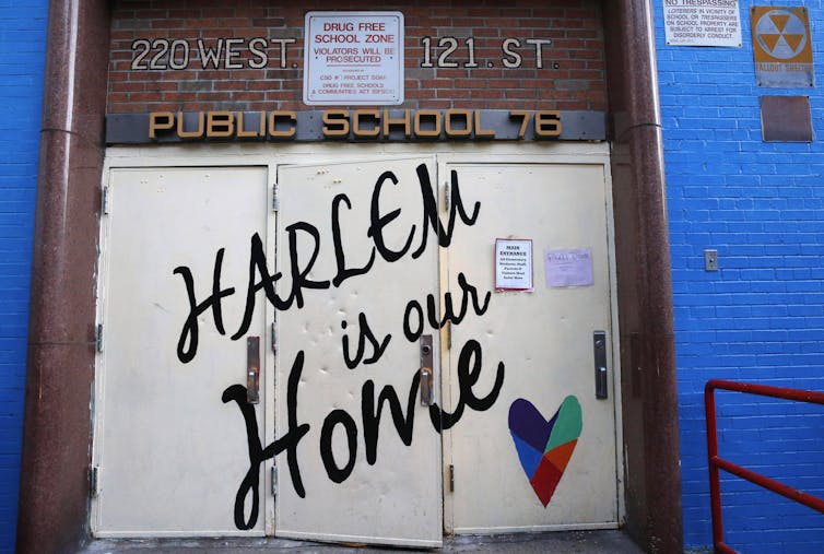 What happens when a big business tries to take over and rename a neighborhood