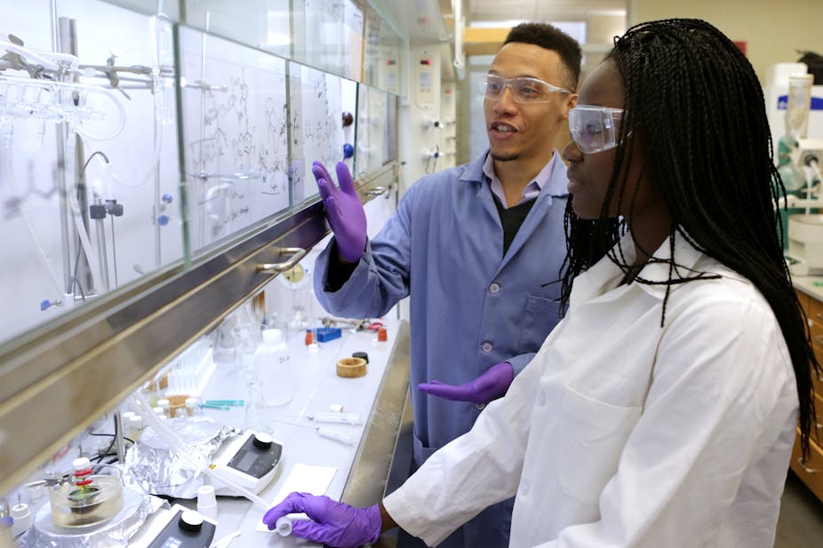 Assistant professor of chemistry Sidney Wilkerson-Hill, left, in a chemistry lab at the University of North Carolina at Chapel Hill, with Bolatito Babatunde, a student in the Chancellor’s Science Scholars program at UNC. Lars Sahl / UNC Chemistry, CC BY