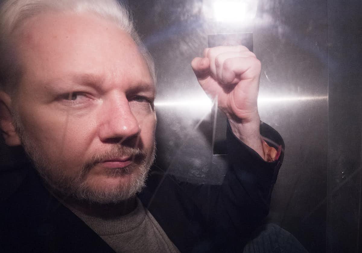 Julian Assange has refused to surrender himself for extradition to the