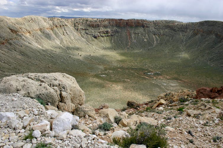 This meteor crater in Arizona was created 50,000 years ago when an iron meteorite struck the Earth. It is about one mile across. W. Herbst, CC BY-SA