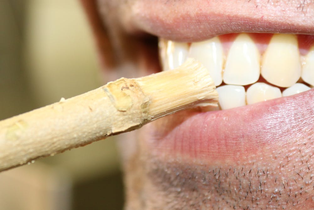 How did people clean their teeth in the olden days?