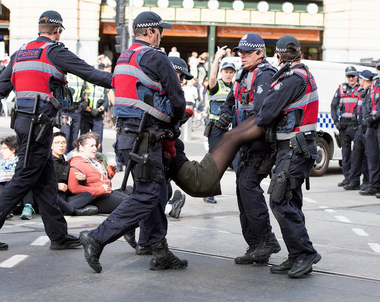 'Lock-on devices' are a symbol of non-violent protest, but they might soon be banned in Queensland