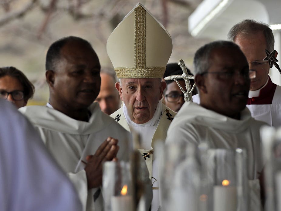Africa's Catholic churches face competition and a troubled legacy as they grow