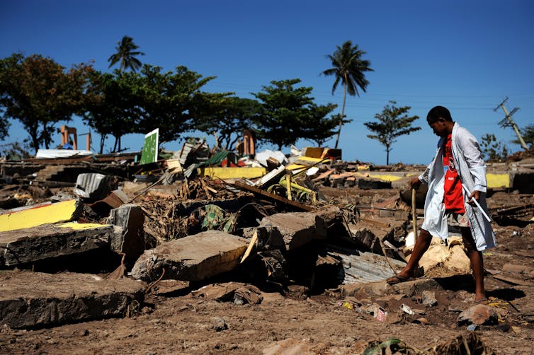 Lessons for a destabilising planet: insights from the 2009 South Pacific earthquake-tsunami disaster