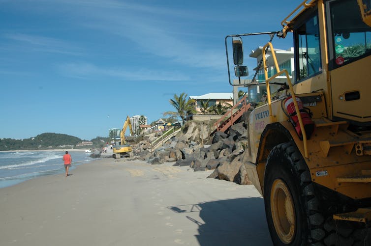 Water may soon lap at the door, but still some homeowners don't want to rock the boat