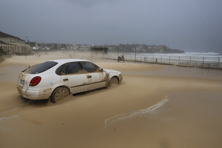 Water may soon lap at the door, but still some homeowners don't want to rock the boat