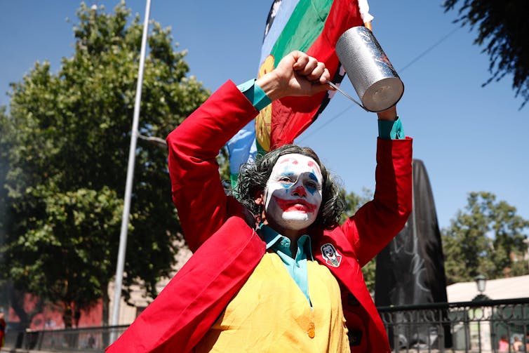 The Joker To Guy Fawkes Why Protesters Around The World Are Wearing The Same Masks