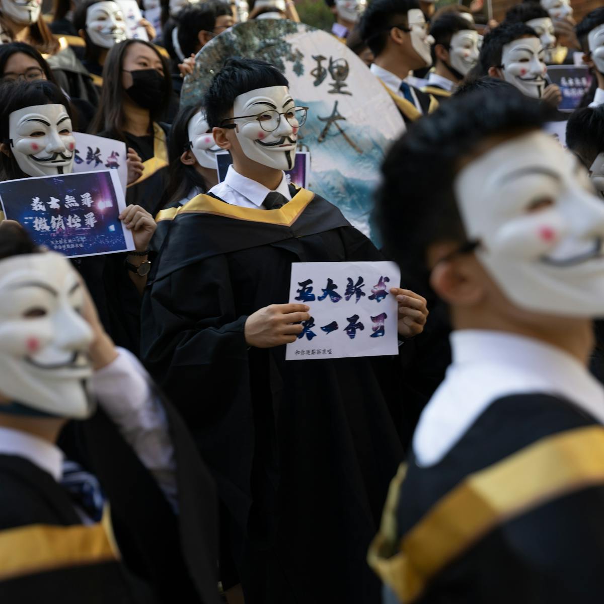 The Joker To Guy Fawkes Why Protesters Around The World Are Wearing The Same Masks