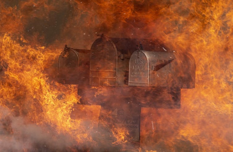 Letter boxes burn north of Los Angeles