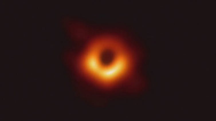 The first image of a black hole. This is the supermassive black hole at the center of the galaxy M87. Event Horizon Telescope Collaboration, CC BY-SA