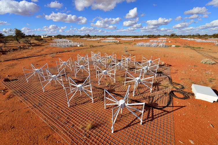 A series of antennas in the desert.