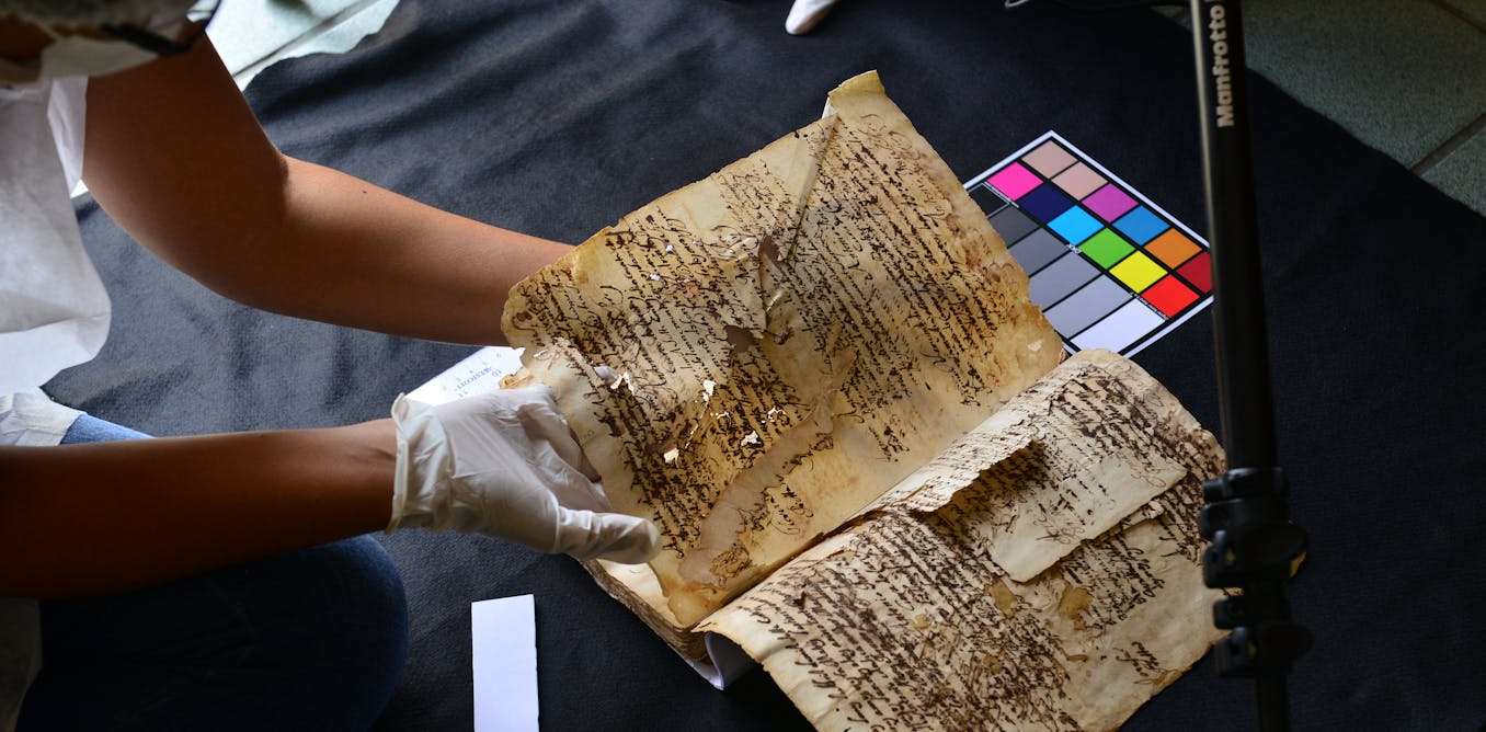 Building a digital archive for decaying paper documents, preserving ...