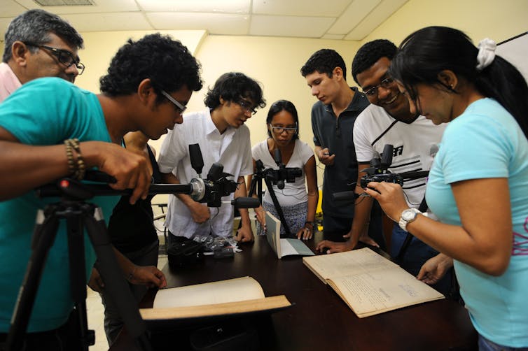 Building a digital archive for decaying paper documents, preserving centuries of records about enslaved people