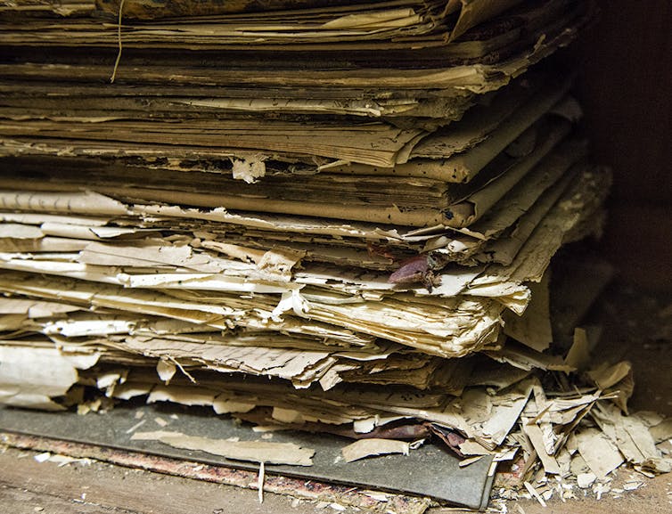 Building a digital archive for decaying paper documents, preserving centuries of records about enslaved people