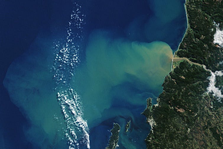 After an atmospheric river event that caused severe flooding in Chile, sediment washed down from hillsides into the Itata River can be seen flowing up to 50 kilometers from the coast. NASA Earth Observatory