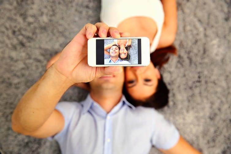 Why people post 'couple photos' as their social media profile pictures