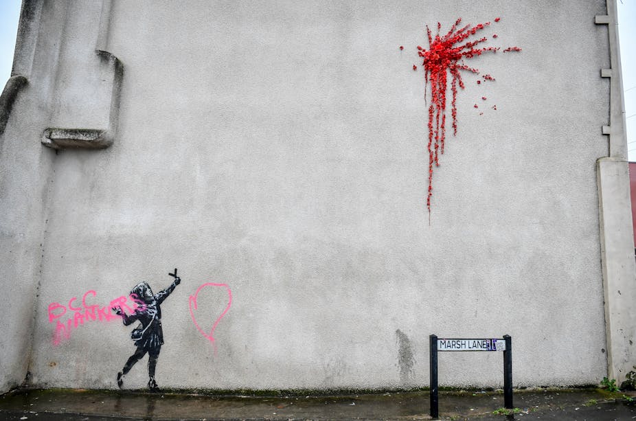 New Banksy Throw Up Street Art Uses Flowers In Unusual Way