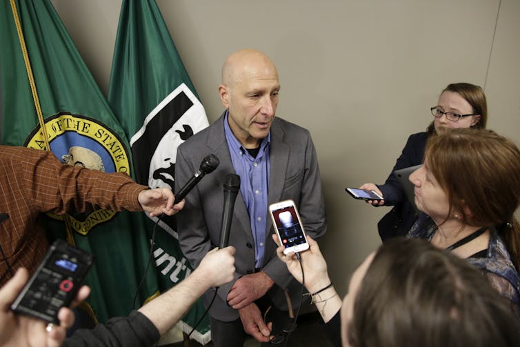 Jeff Duchin, health officer, Public Health for Seattle and King County takes questions following the death of a King County, Washington resident due to the novel coronavirus. Getty/Jason Redmond/AFP