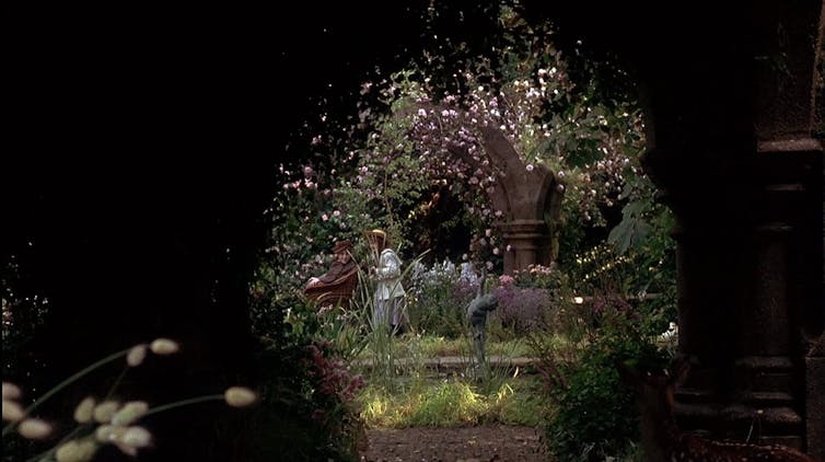 Movie still from 1993, children play in the garden