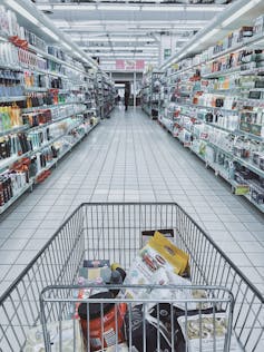 Stay home if you can. But if you use a shopping cart, wipe it down with disinfecting solution and clean your hands afterwards. (Pexels)