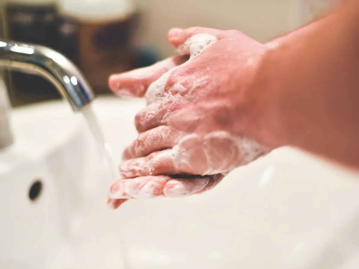 My skin's dry with all this hand washing. What can I do?