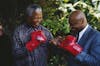 Former South African President Nelson Mandela with former American world boxing champion Marvin Hagler. The undated photo was taken after Mandela’s release. Louise Gubb/GettyImages