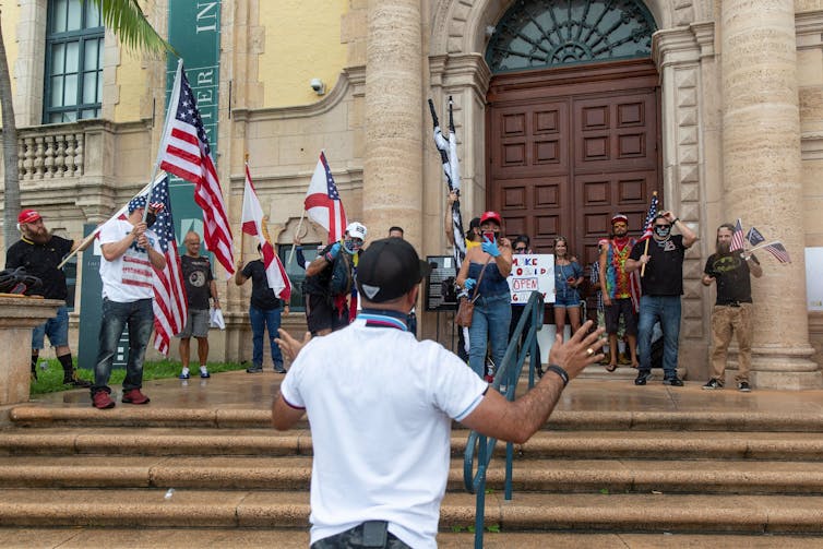 Why are white supremacists protesting to 'reopen' the US economy?