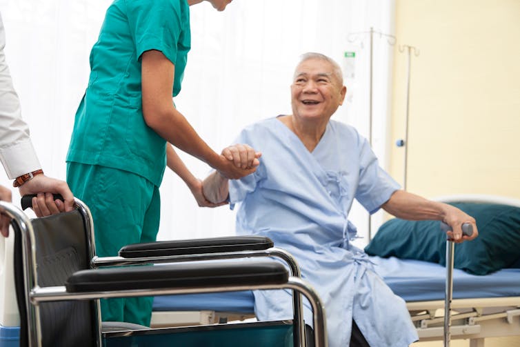 Exercises like sitting on the edge of the patient’s bed can help them build up strength. JOKE_PHATRAPONG/ Shutterstock