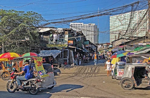 'Forced' evictions eat away at a Manila community as developer spares the golf course next door