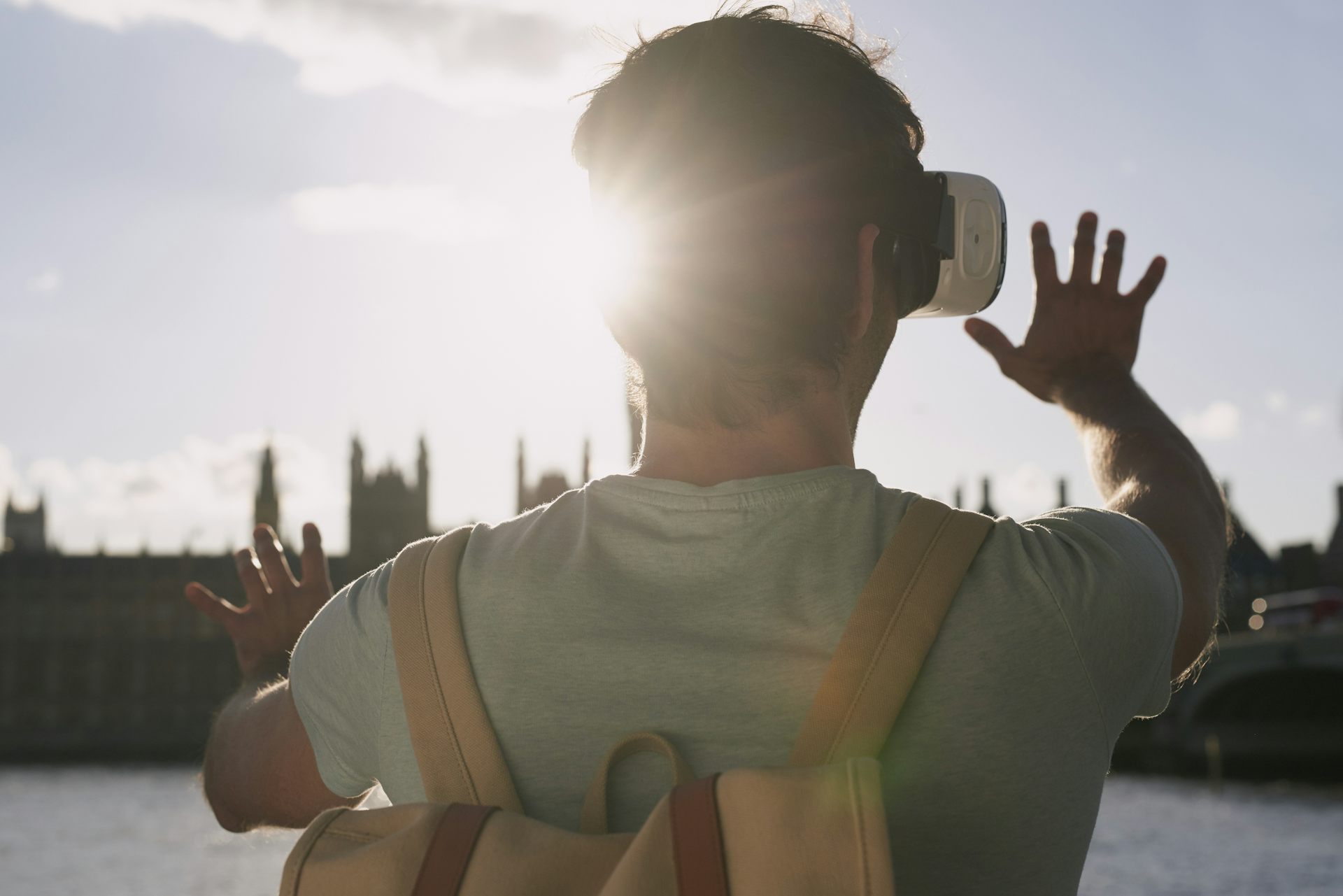 Real travel. Man wearing VR Headset. Travel World VR. VR travelling.