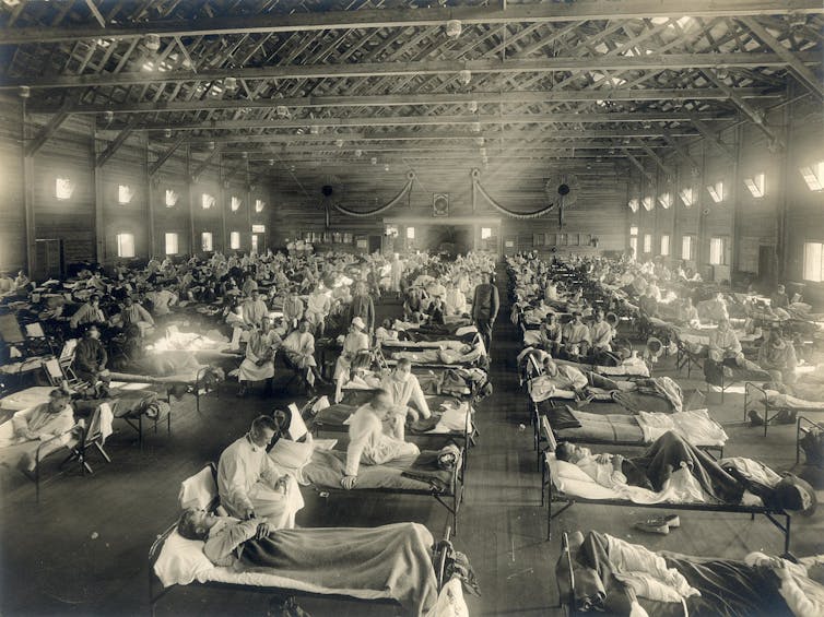 Emergency hospital during the 1918 flu epidemic, Camp Funston, Kansas. | Wikimedia Commons