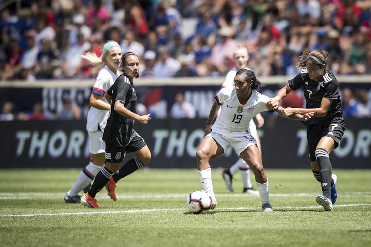 As professional sports come back, members of the US women's soccer team are still paid less than the men's