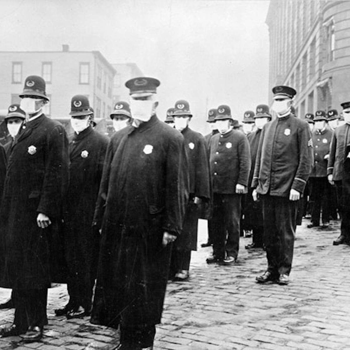 Mask resistance during a pandemic isn't new – in 1918 many ...