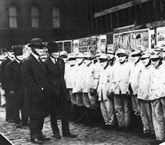 Mask resistance during a pandemic isn't new – in 1918 many Americans were 'slackers'