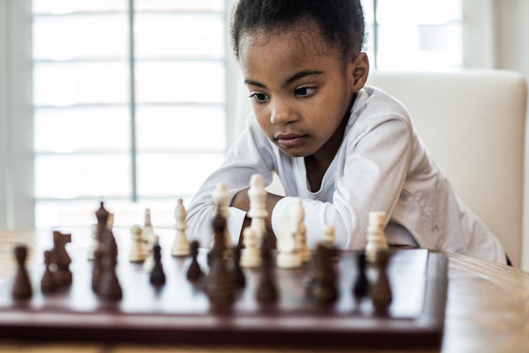 Does chess promote white privilege because white always goes first?