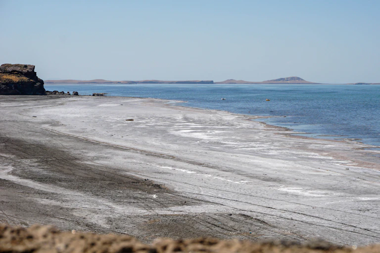 Beach lake with salty shoreline.