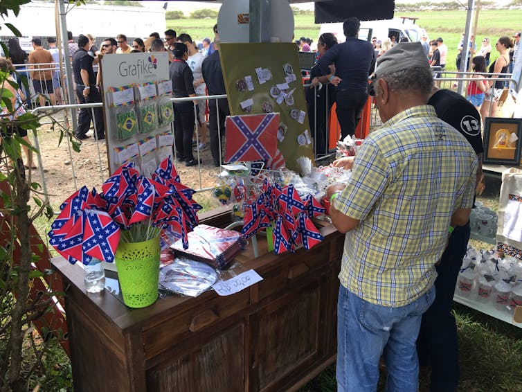 Confederate flags fly worldwide, igniting social tensions and inflaming historic traumas