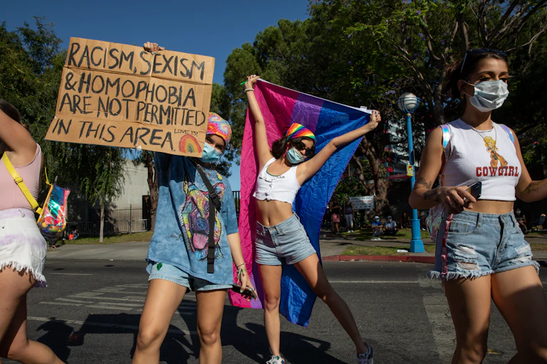 Activists with a placard.