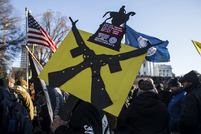 A sign depicting firearms.