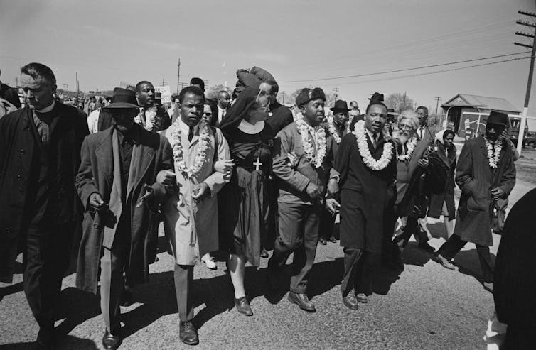 Religious leaders march with the Rev. Martin Luther King Jr.