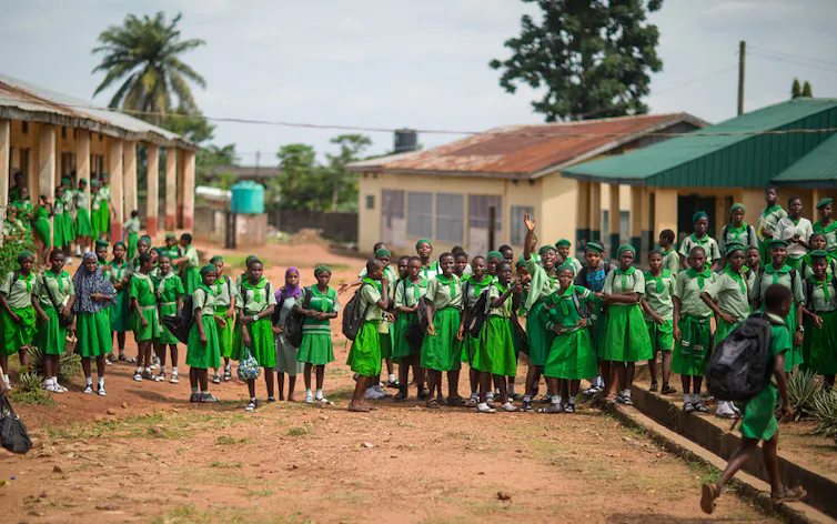 Girls on road outside school