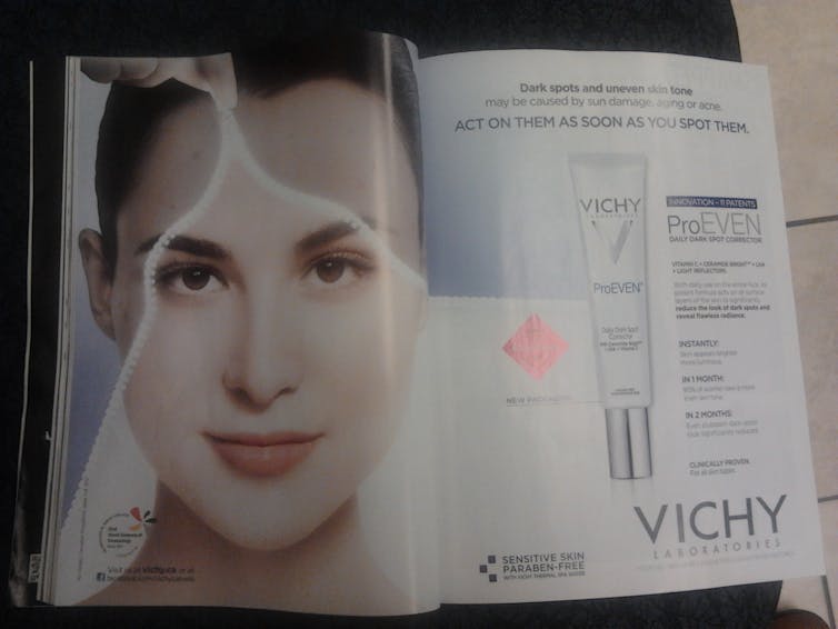 A magazine ad shows a woman's face becoming lighter