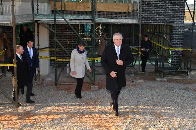 Prime Minister Scott Morrison arrives at a home construction site to announce the HomeBuilder scheme.