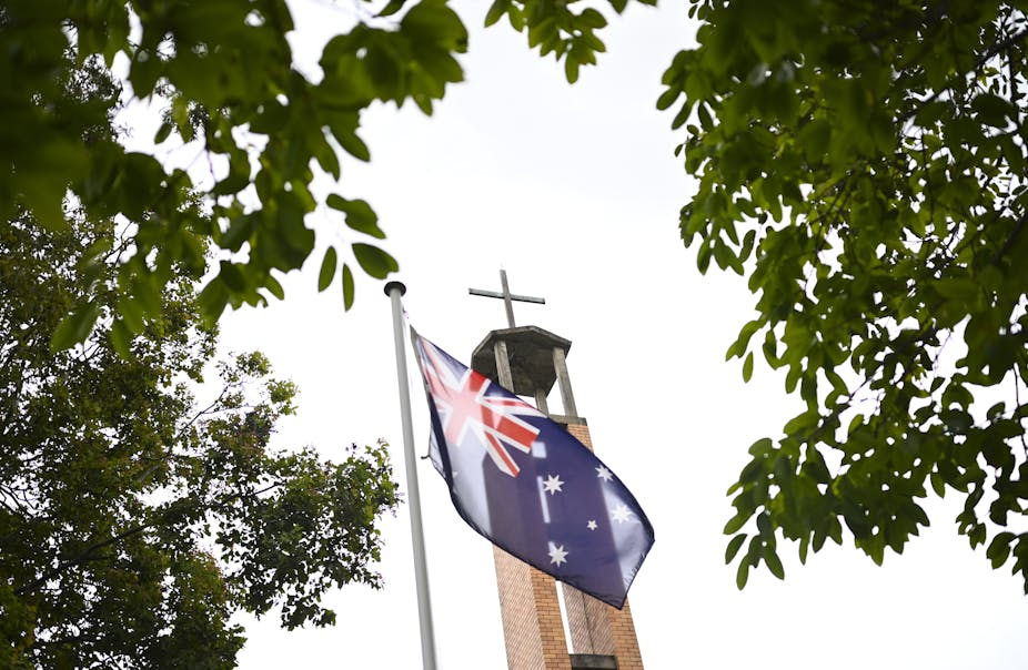 Australian flag flying in front of church
