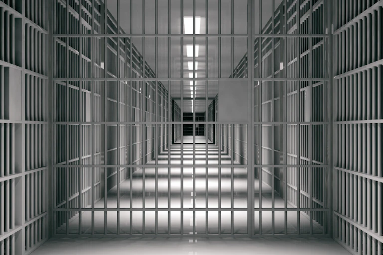 Inside prison with locked doors and corridors