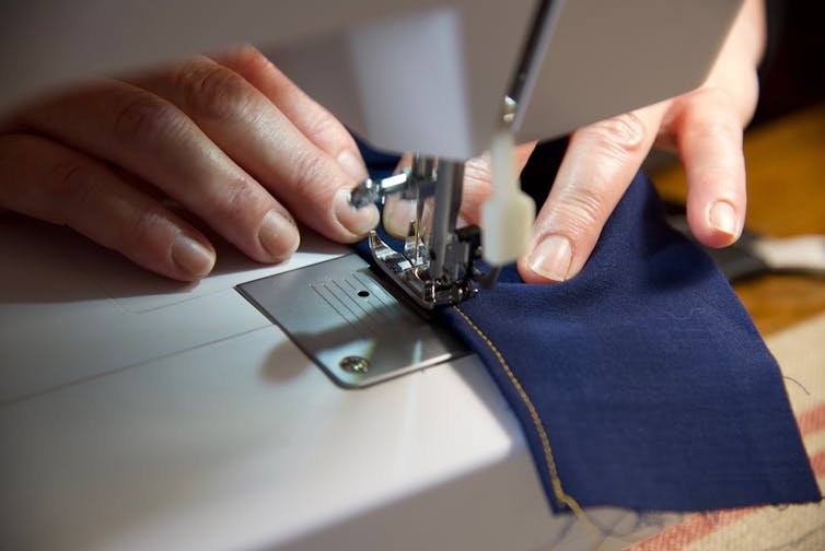 Using sewing machine to make face mask