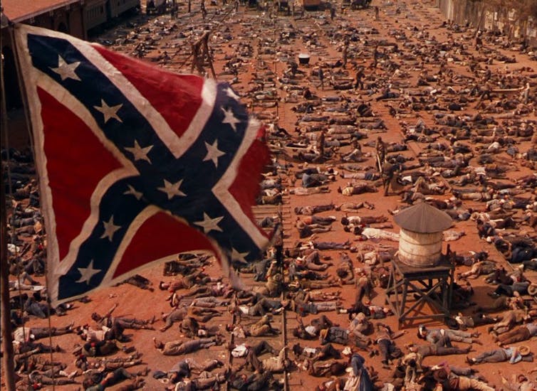 Confederate flag flies over the battlefield in Gone with the Wind.